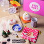 The Doki Doki Kawaii Crate by Japan Crate features kawaii Japanese-themed items like a clock, ceramic dishes, mug, pouch, figurines, and more—perfectly displayed on a tatami mat. thumbnail 1